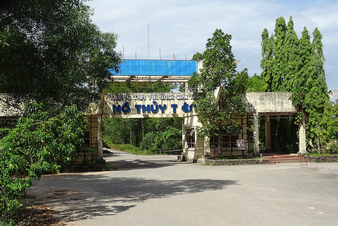 Overgrown slides and seating at Ho Thuy Tien abandoned water park, the half-finished Vietnam resort near Hue.
